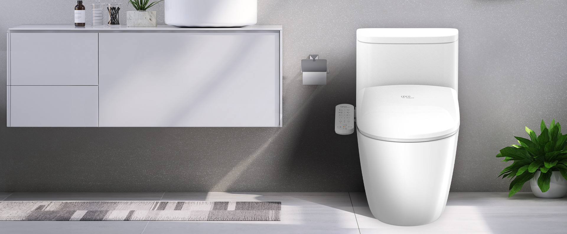 벽걸이형 세면대와 세스코(CESCO) 비데 기능이 있는 변기가 있는 욕실입니다.